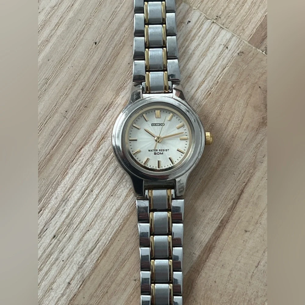Seiko Ladies Watch Spiral Stainless Dial Gold-Tone Markers Two-Tone Bracelet